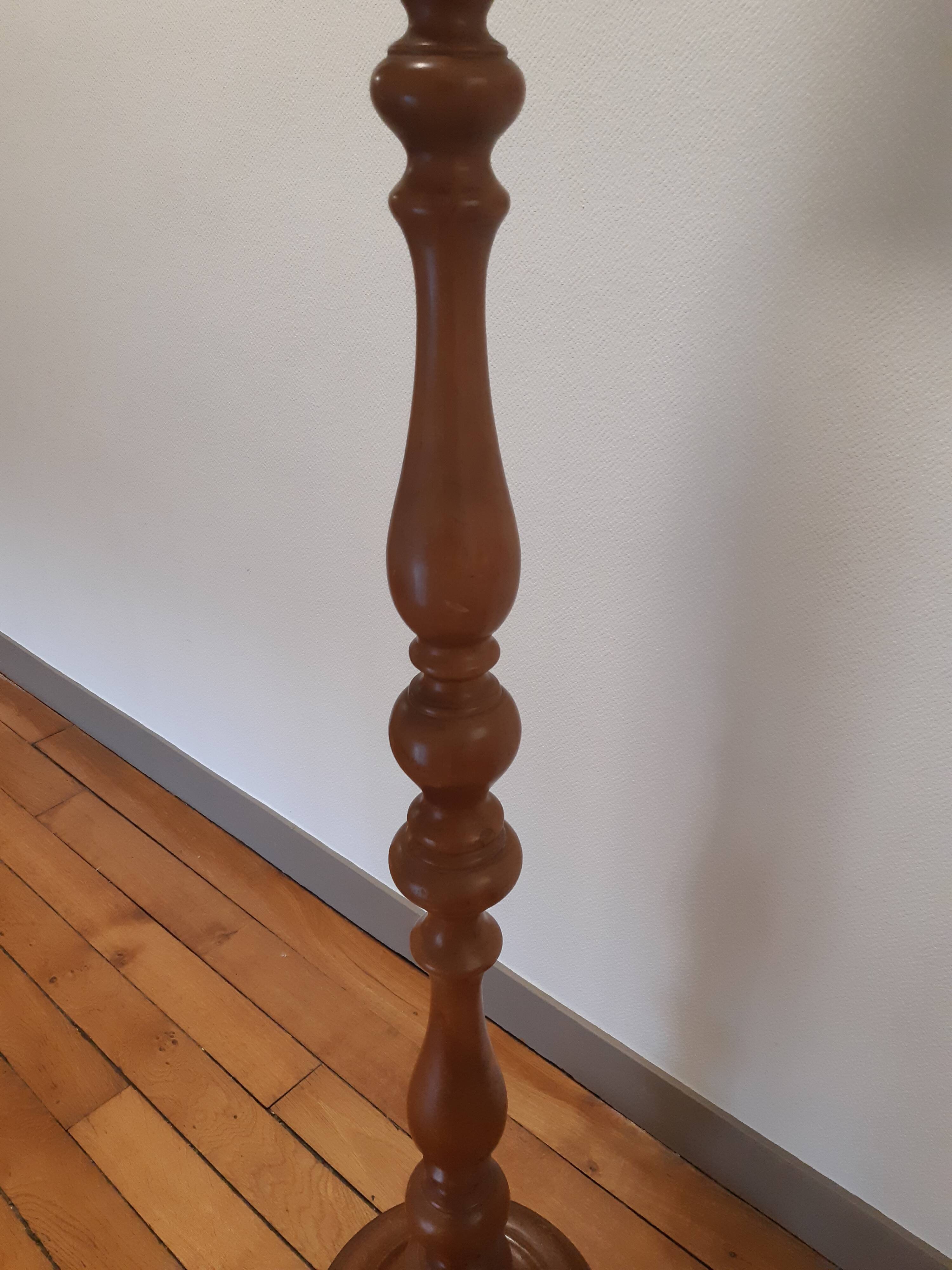 Carved wooden lamppost