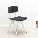 Friso Kramer "Result" chair upholstered in black and white.