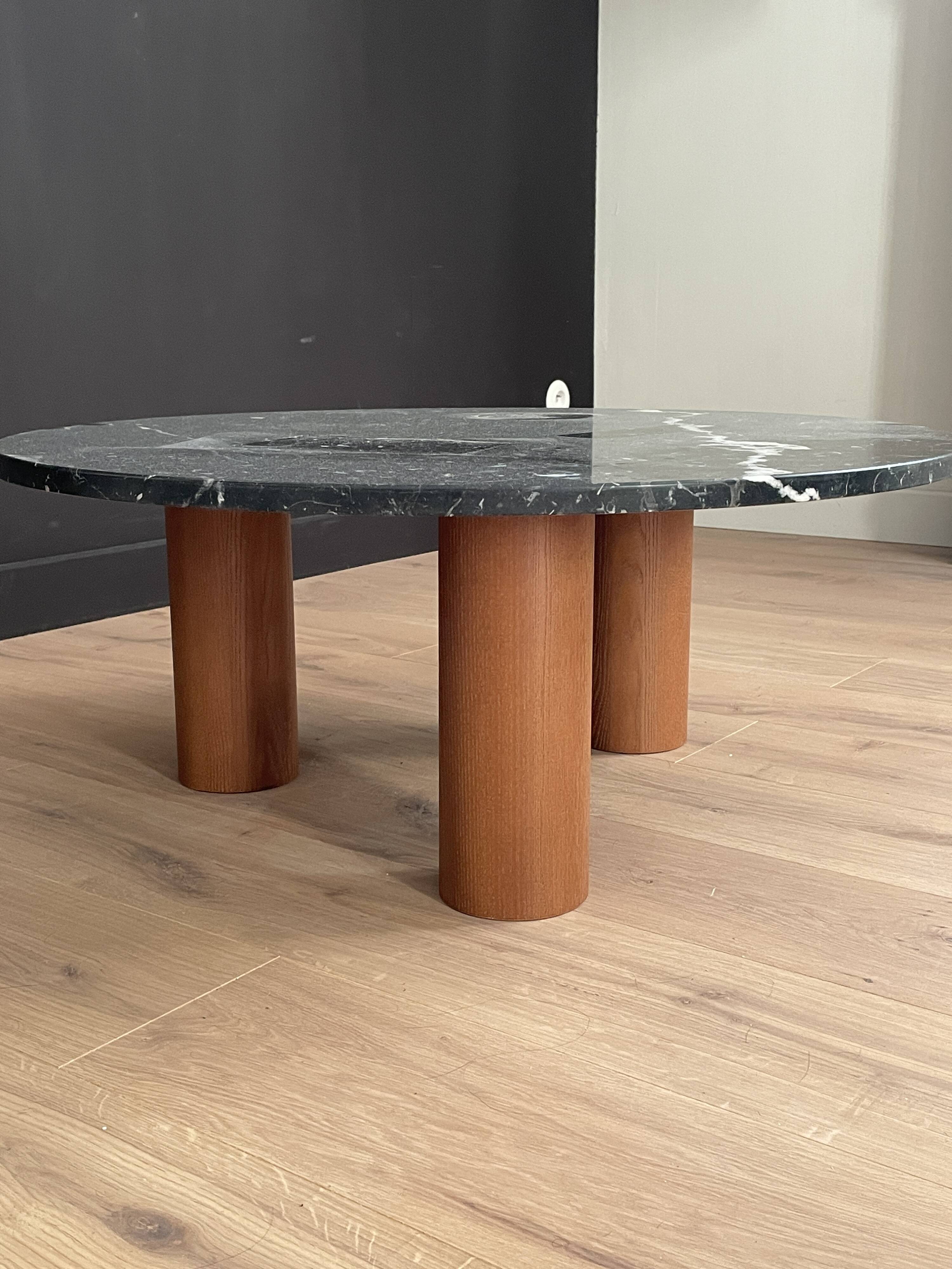 Black marble coffee table with wooden legs