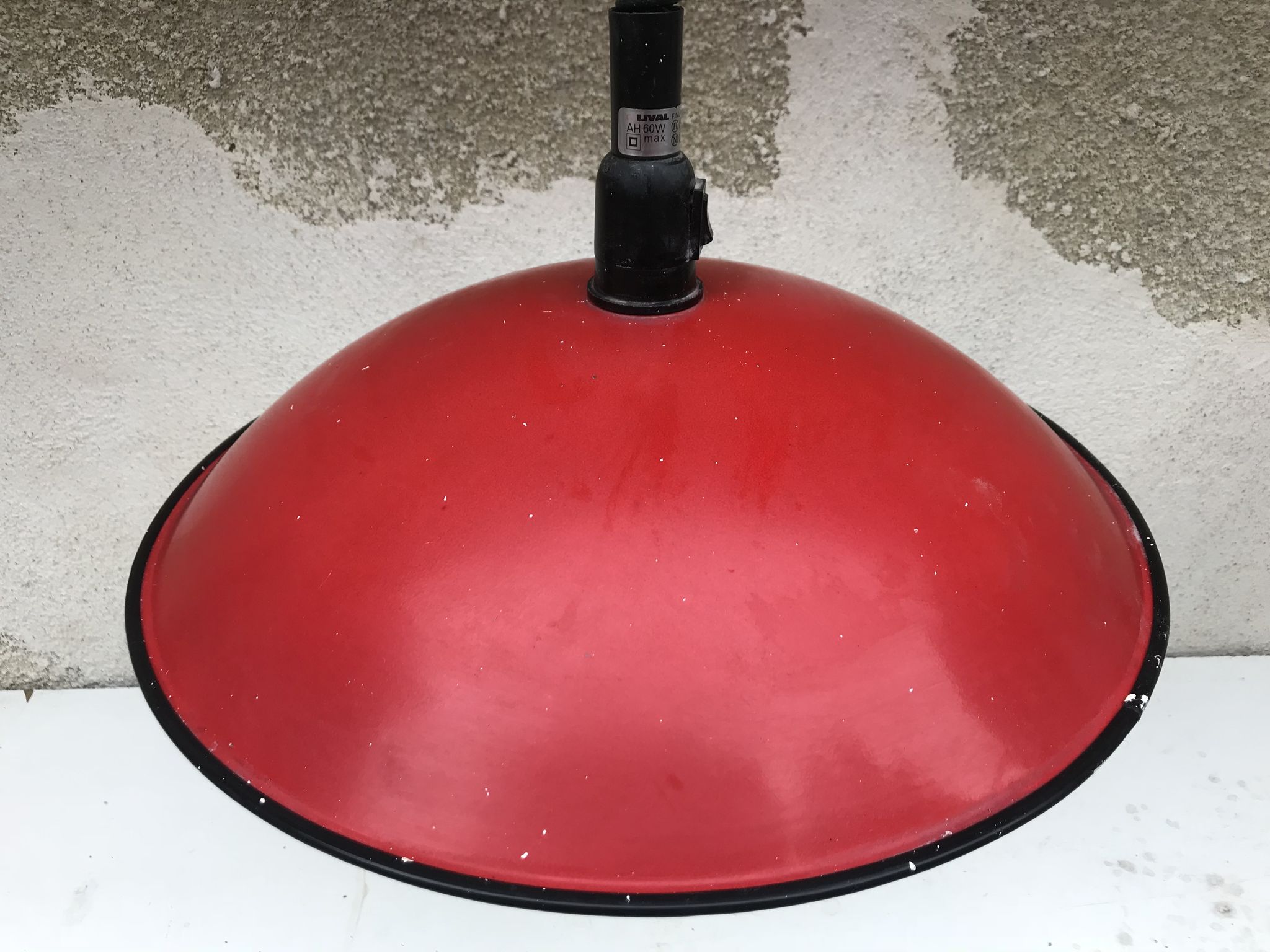 Old red metal suspension lamp from the 70s
