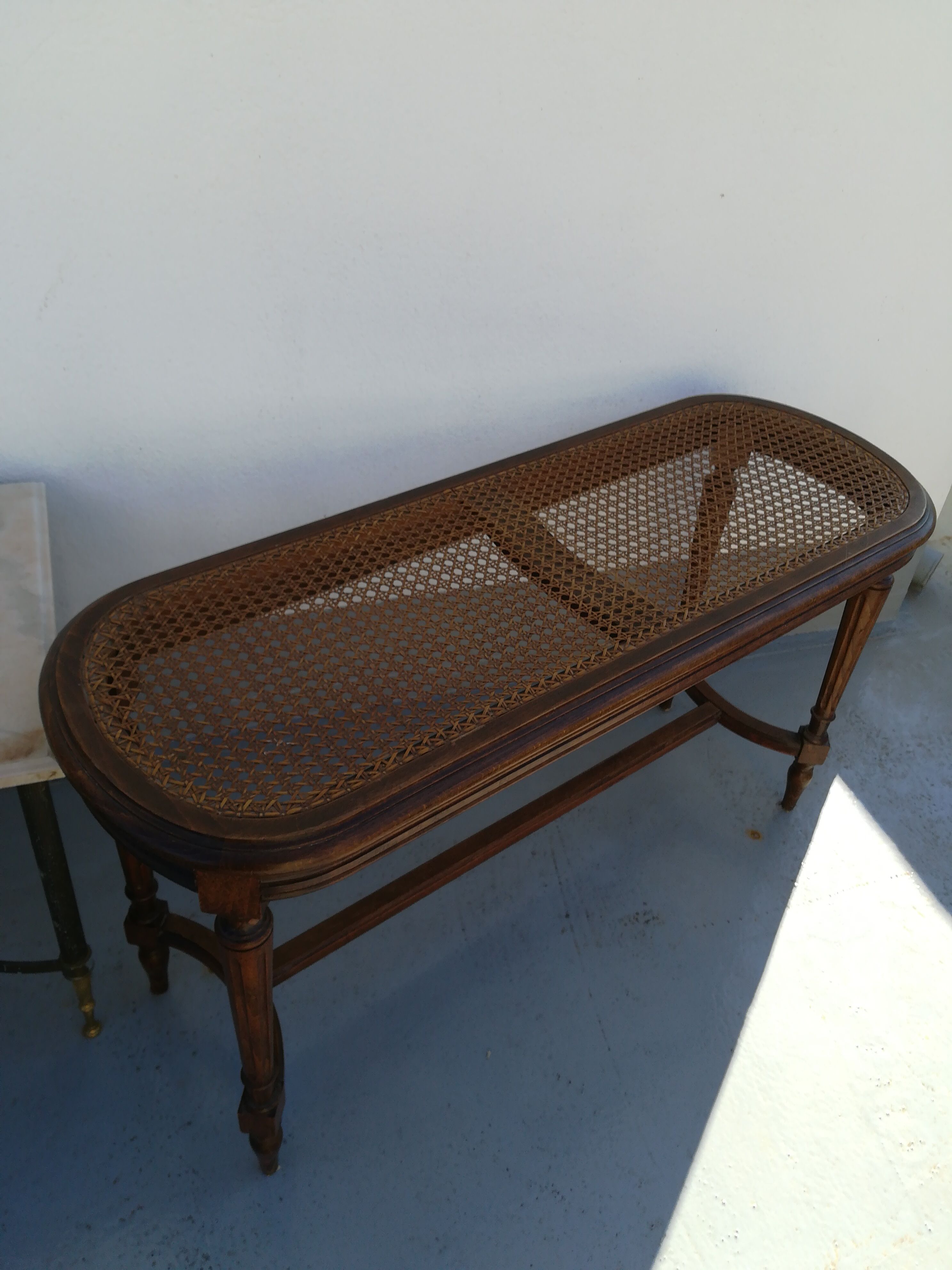 Piano bench in caning