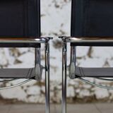 Cantilever armchair in chromed metal and black leather, 1970