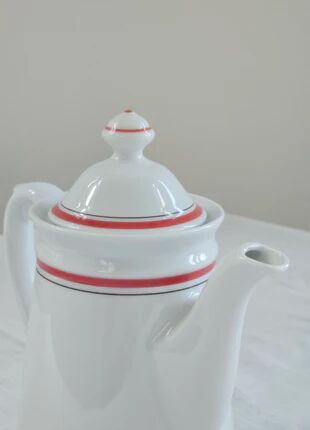White porcelain coffee pot by Winterling with red lines.