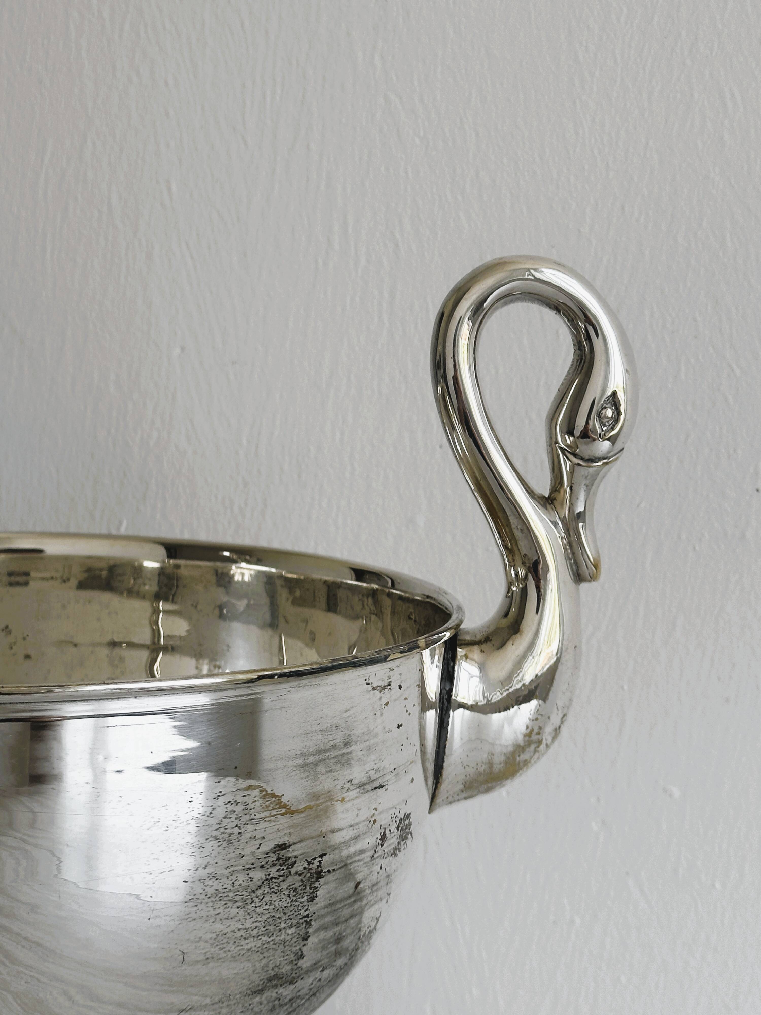 Large glass, metal champagne bucket