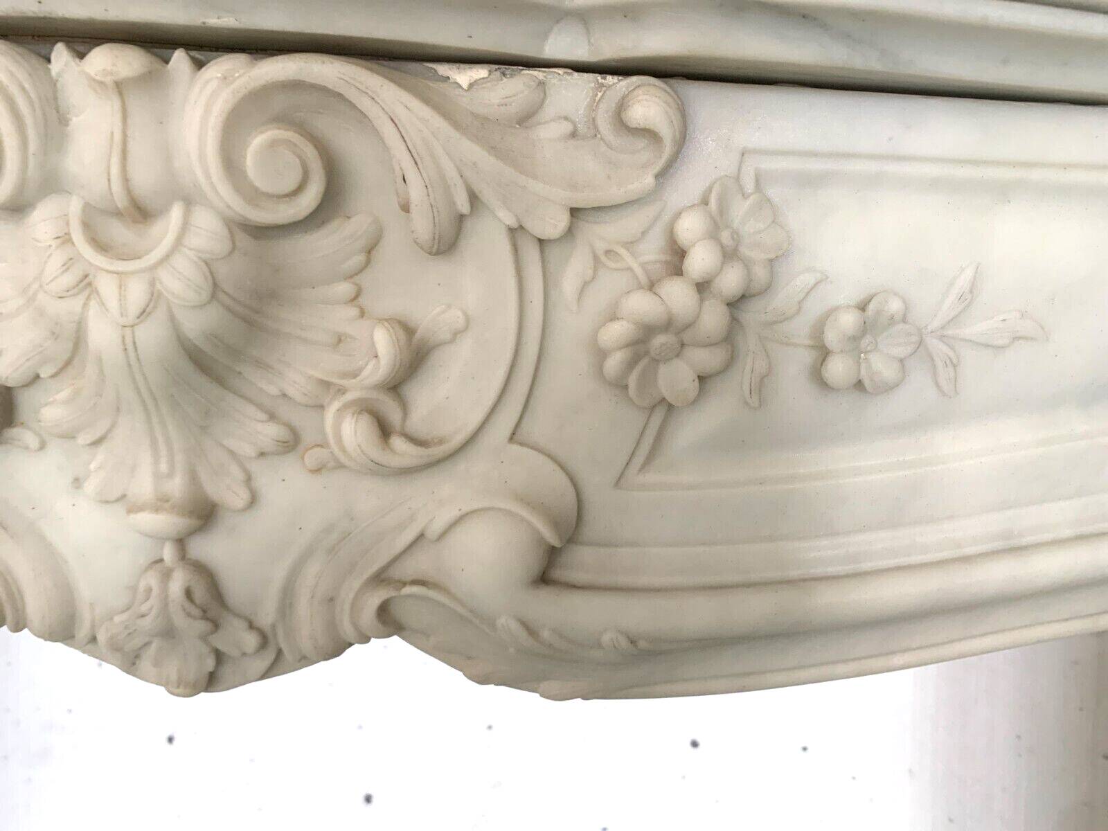 Louis XV style fireplace in white Carrara marble 19th century