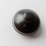 Vintage ceramic teapot from the 1980s, black with white stripes and a metal handle.