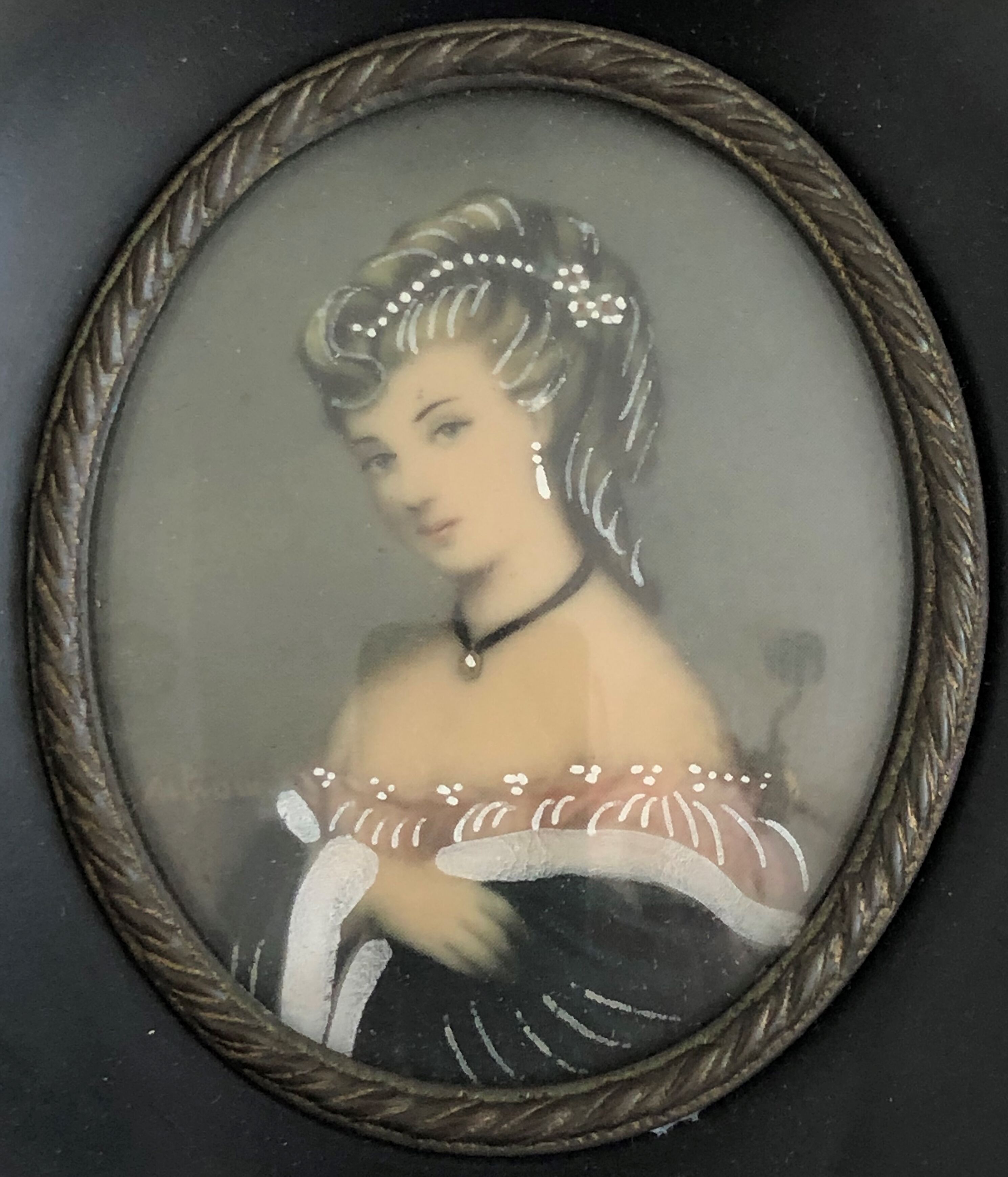Portrait of a miniature young woman