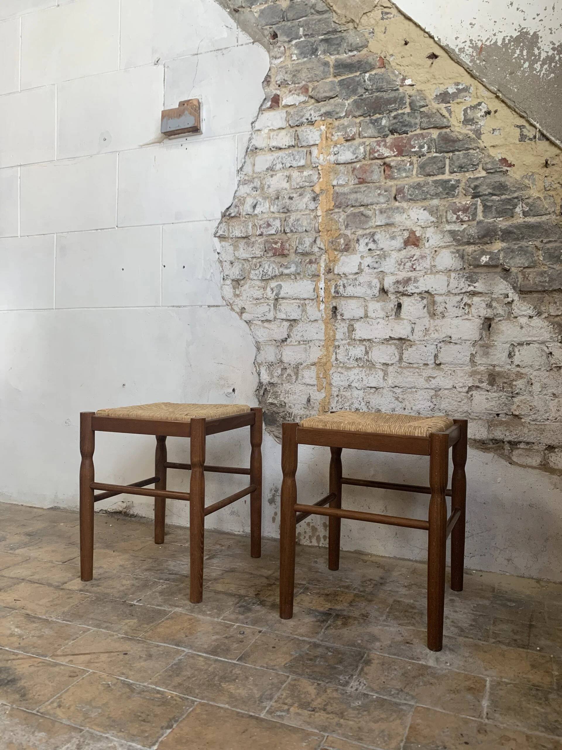Pair of 20th-century wooden stools with straw seats