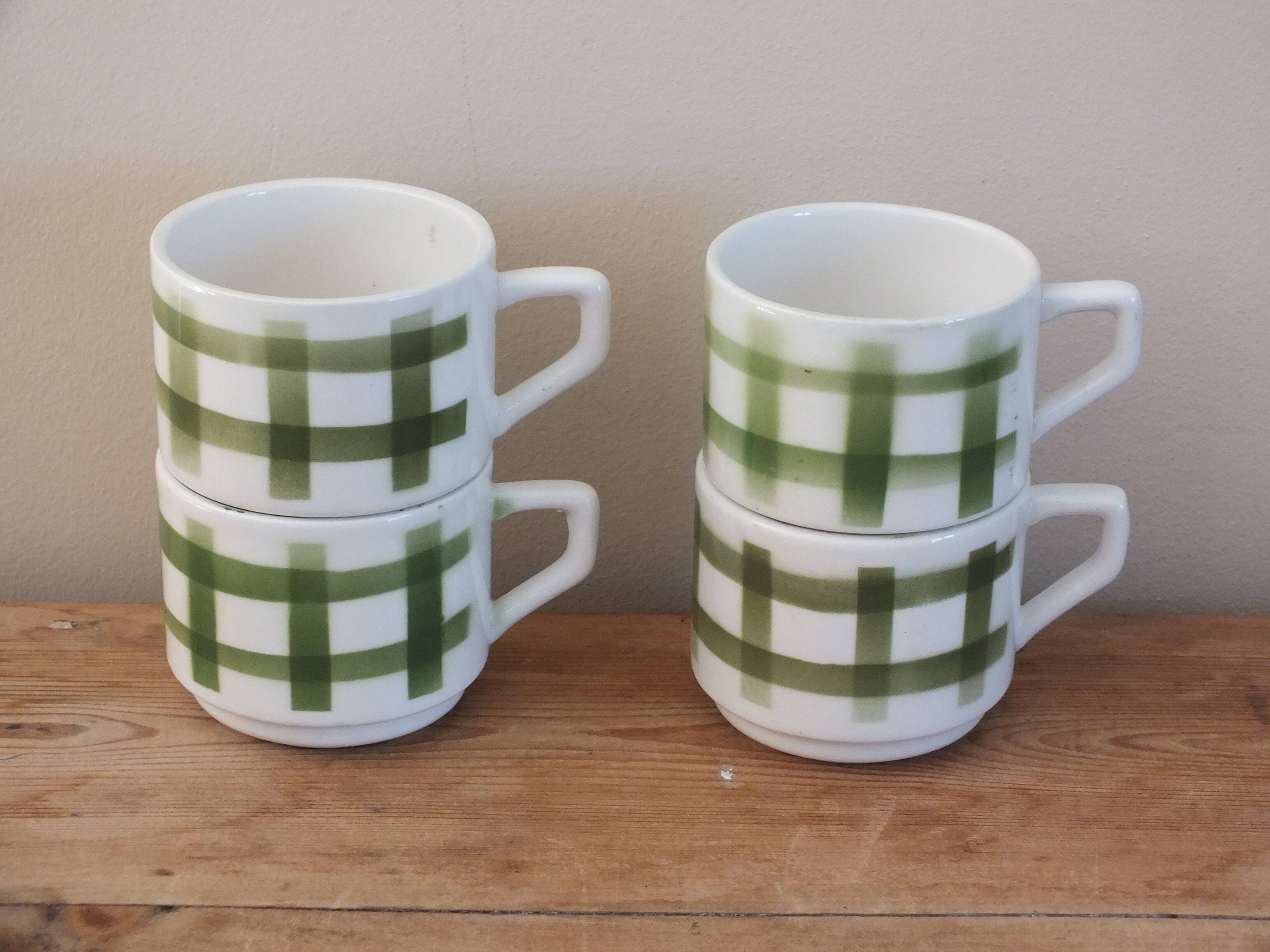 4 vintage cups with green tile decor