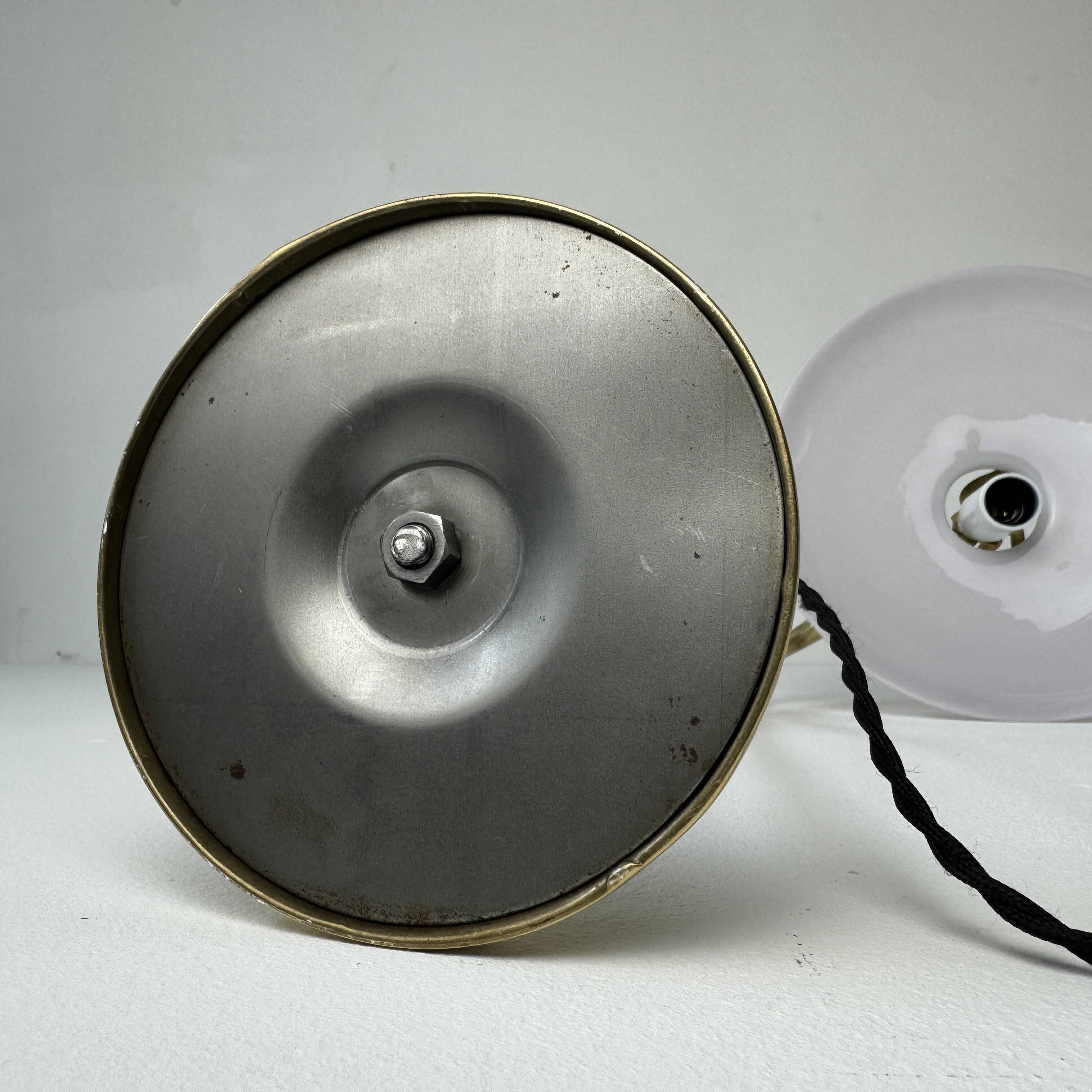 Vintage desk lamp that raises and lowers.