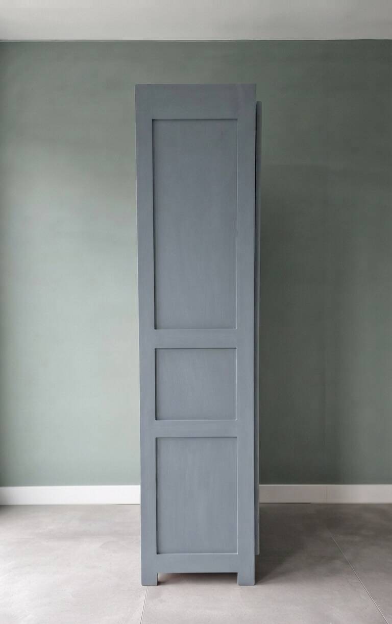 Vintage grey wooden wardrobe from 1914.