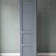 Vintage grey wooden wardrobe from 1914.