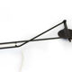 Adjustable "string" type wall light with green original shade.