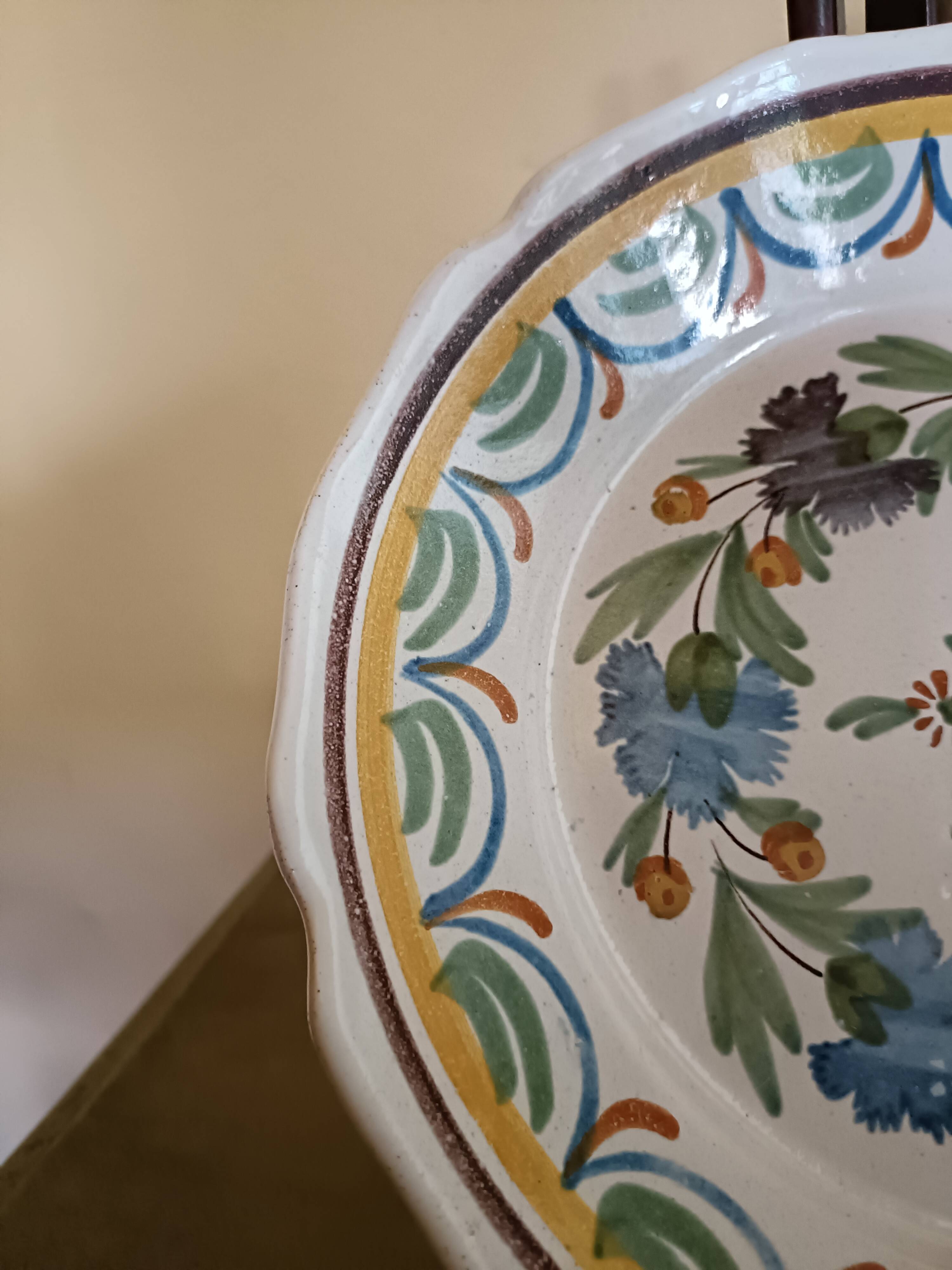 Antique hollow plate from Nevers pottery.