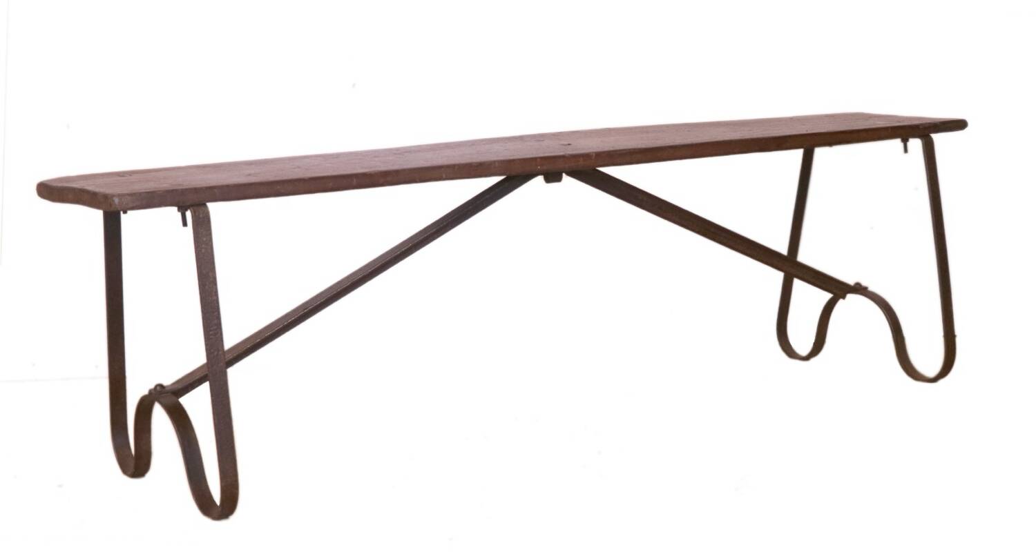 Old bench in Burmese teak with a wrought iron base.