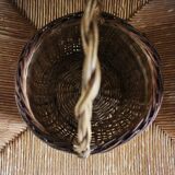 Small round wicker basket with one handle