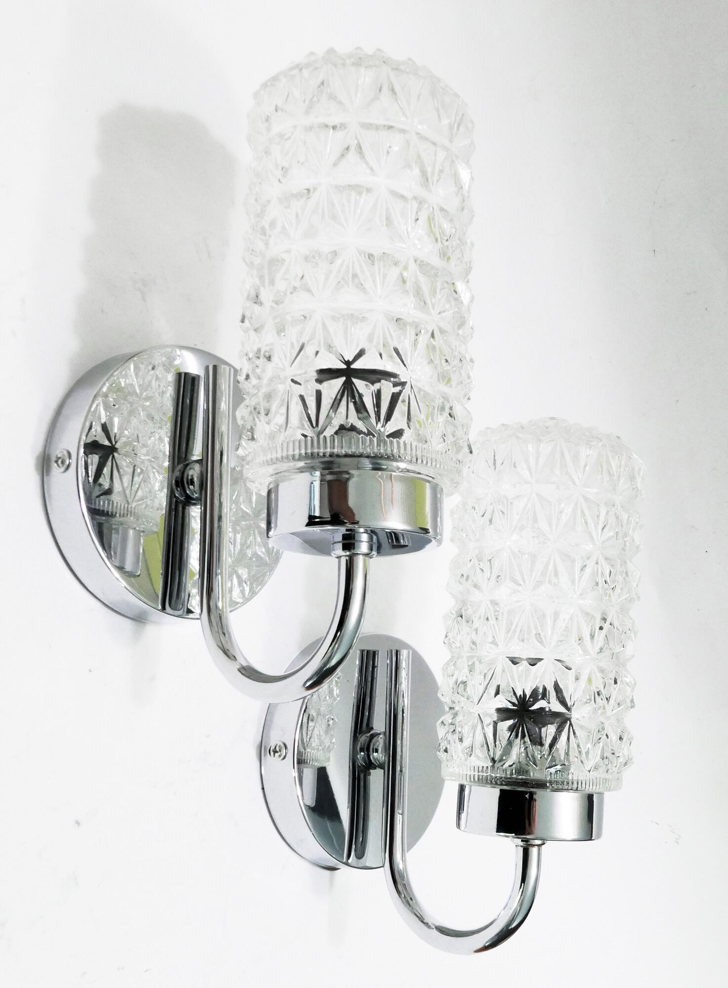 Pair of 1970 chrome metal wall light and molded glass globes.