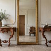 Pair of carved wall consoles in Louis XV style