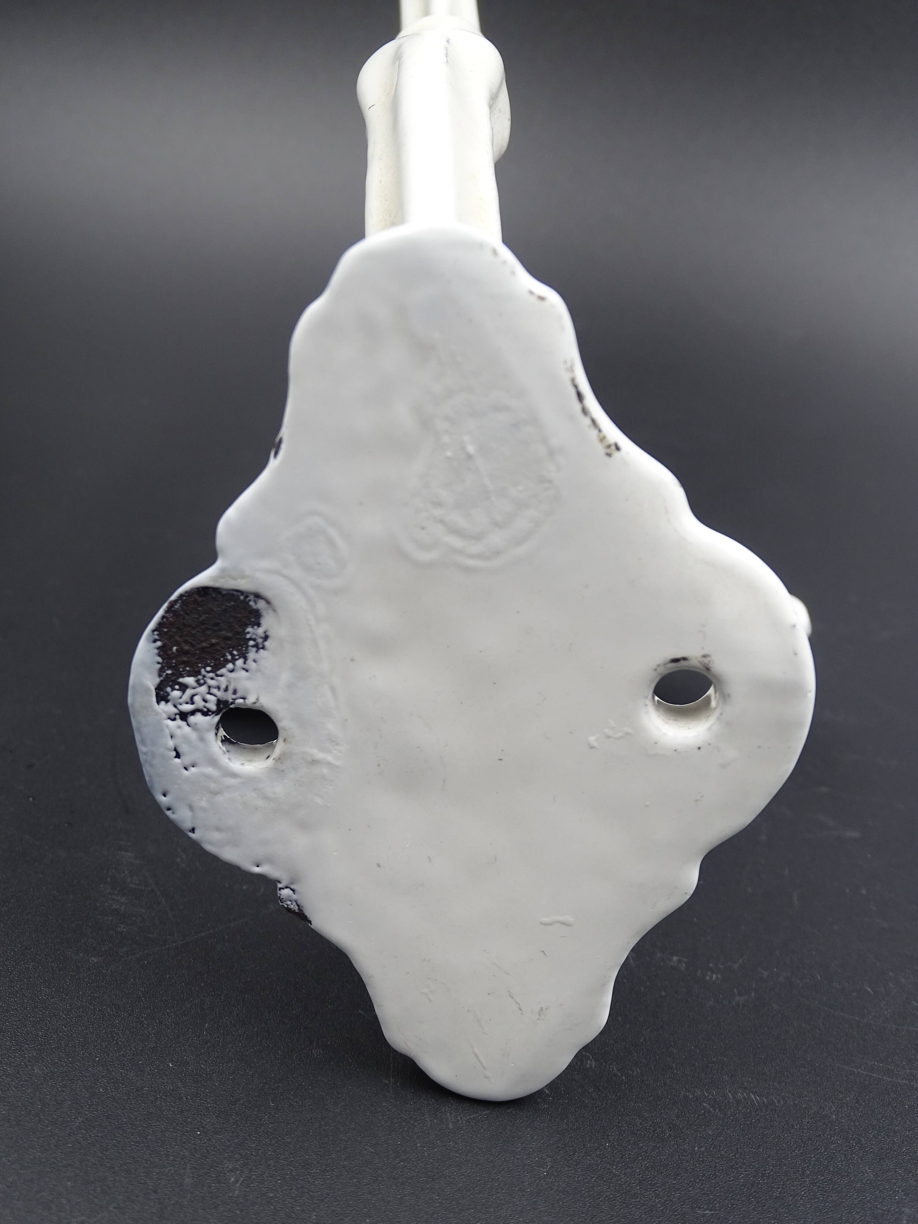 Old white enamelled metal patère