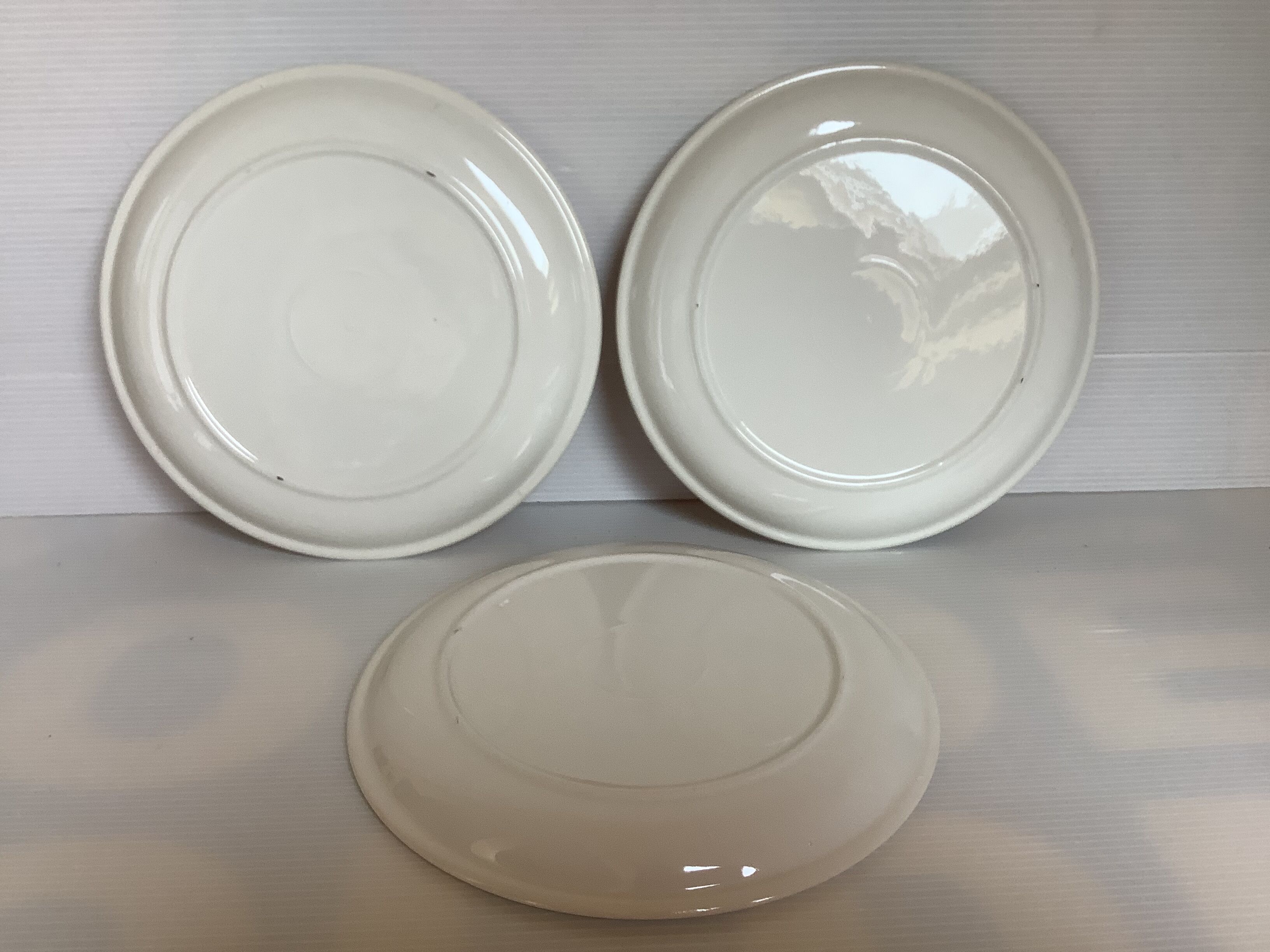 Six vintage floral cheese plates.