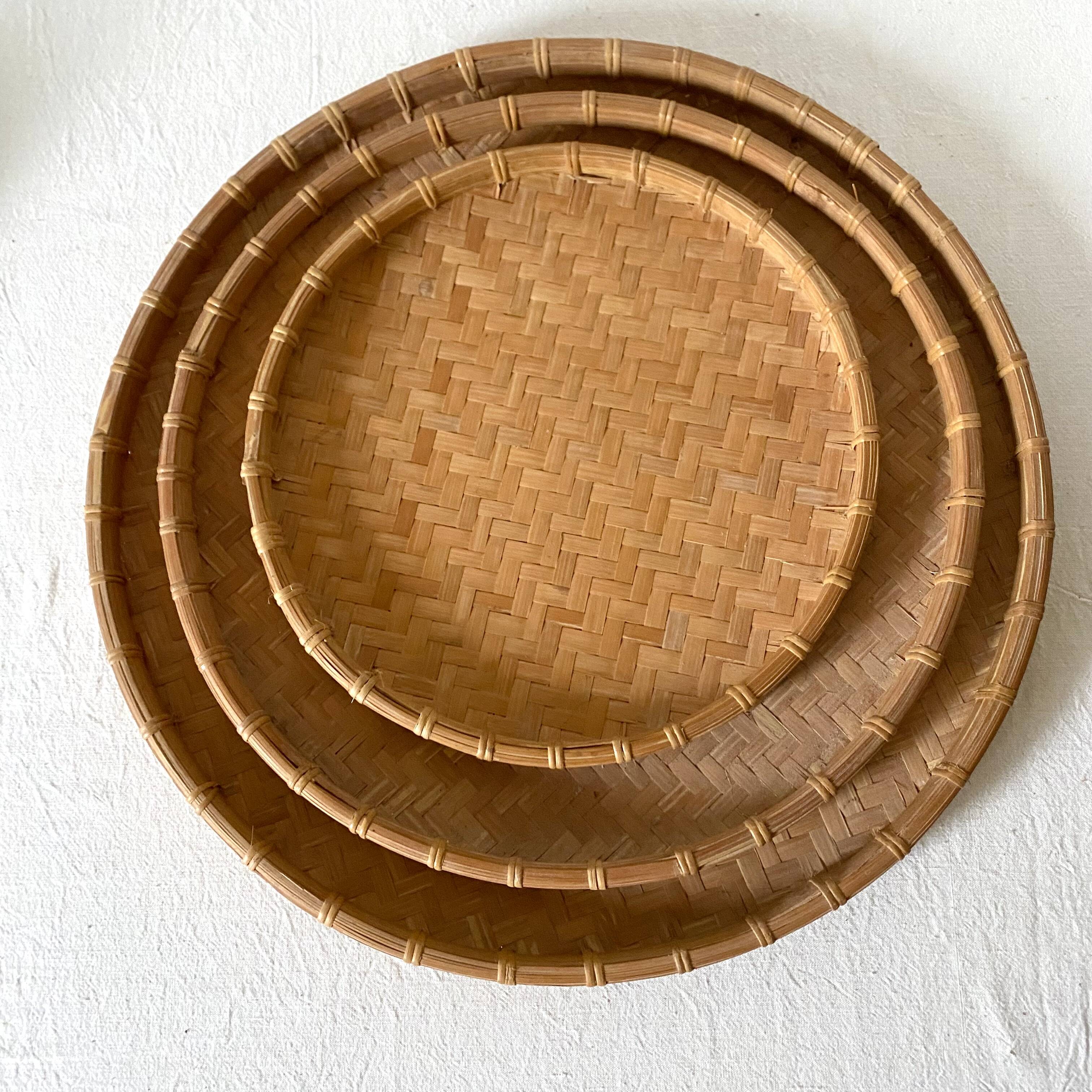 Round nesting trays in woven bamboo