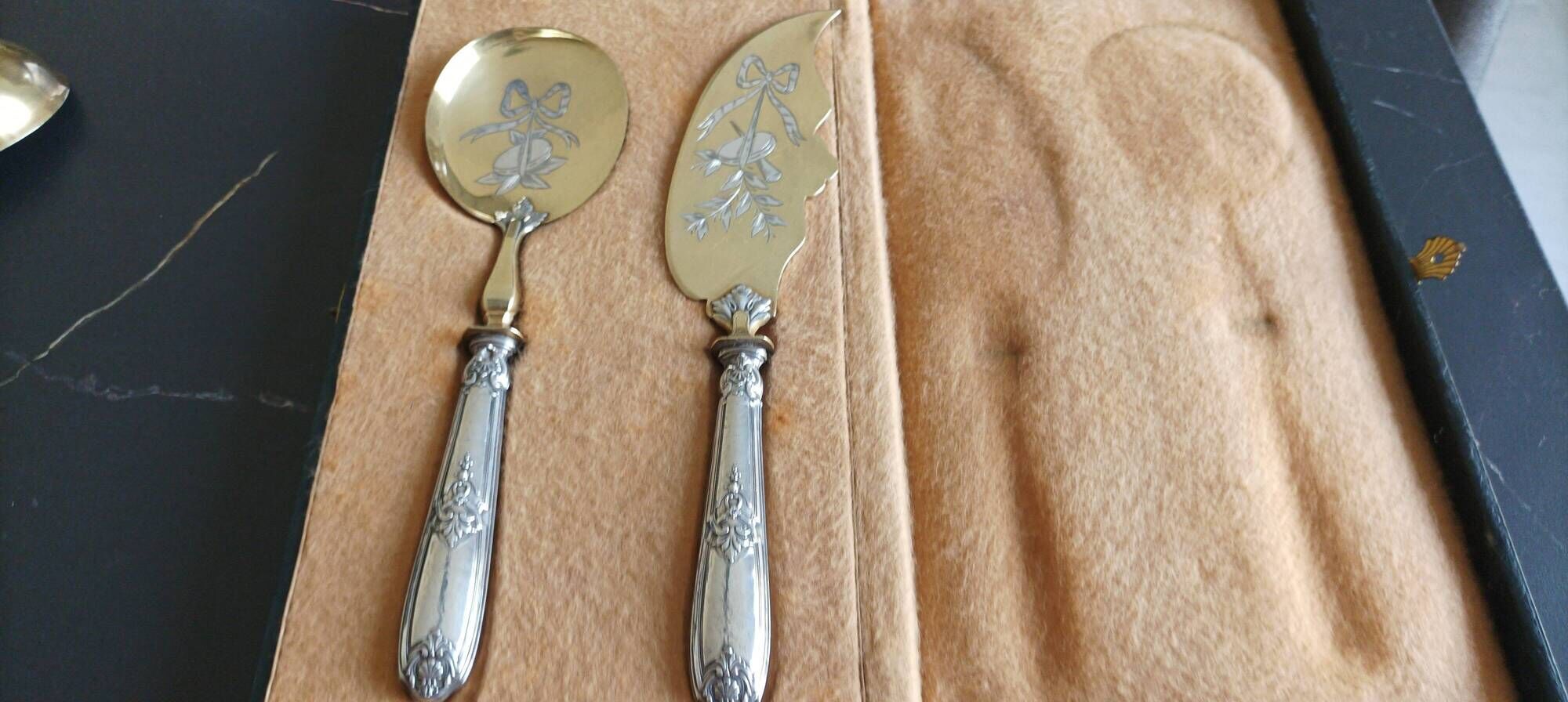 Ice cutlery with silver-plated handles