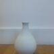 White ceramic with dolphin motif