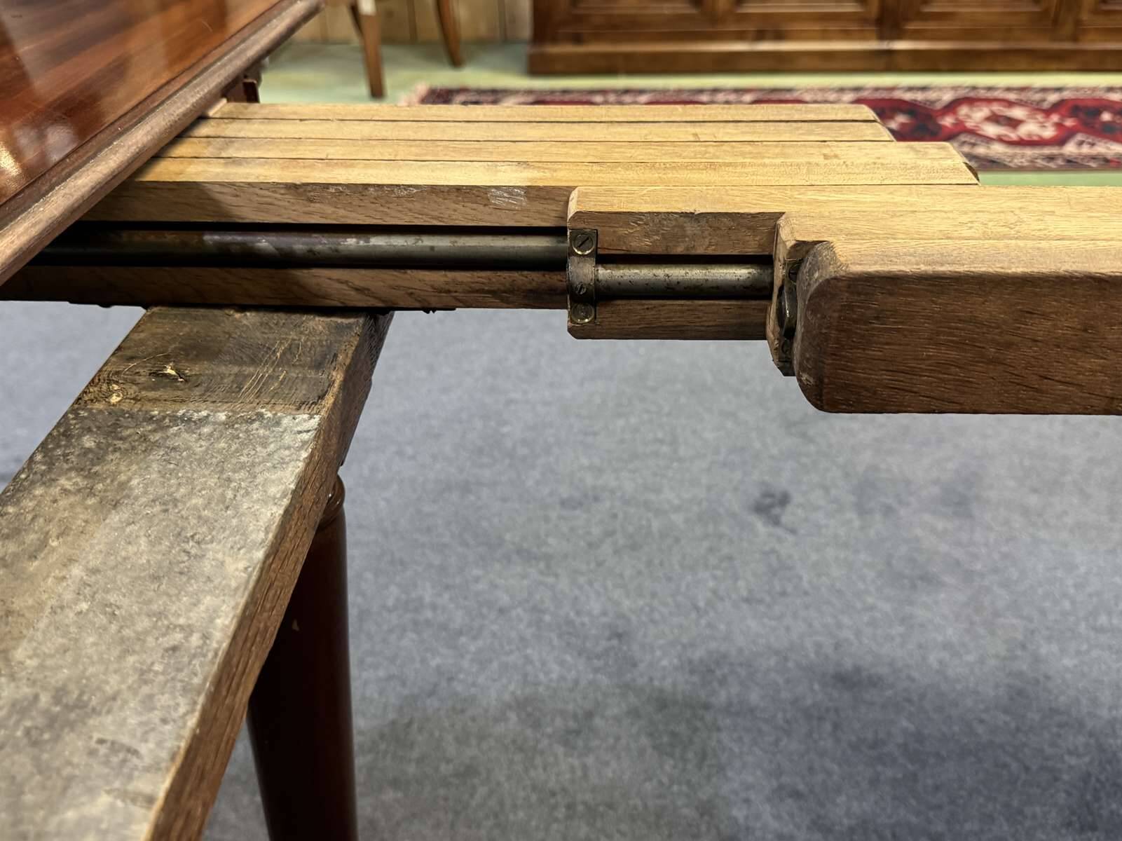 19th-century Louis XVI dining table in Cuban mahogany.