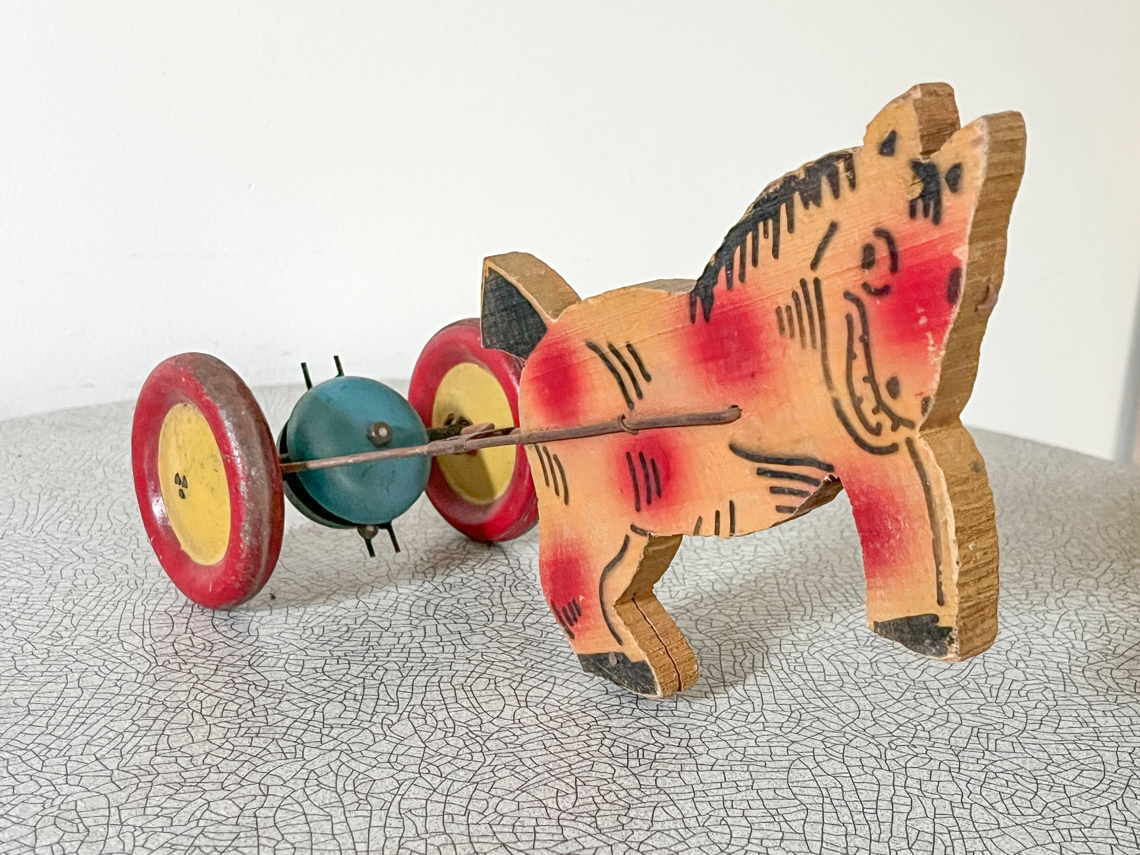 Vintage pull-along toy, horse-drawn with a bell, musical toy.