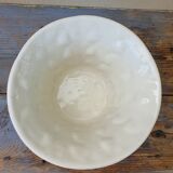 Important white earthenware pot cache with leafy decoration