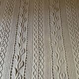 Old hand-knitted wool bed cover