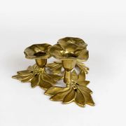 Art Nouveau style three-flower brass candle holder