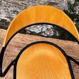 Pair of wooden and black metal chairs