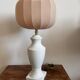 White ceramic table lamp with pastel shade