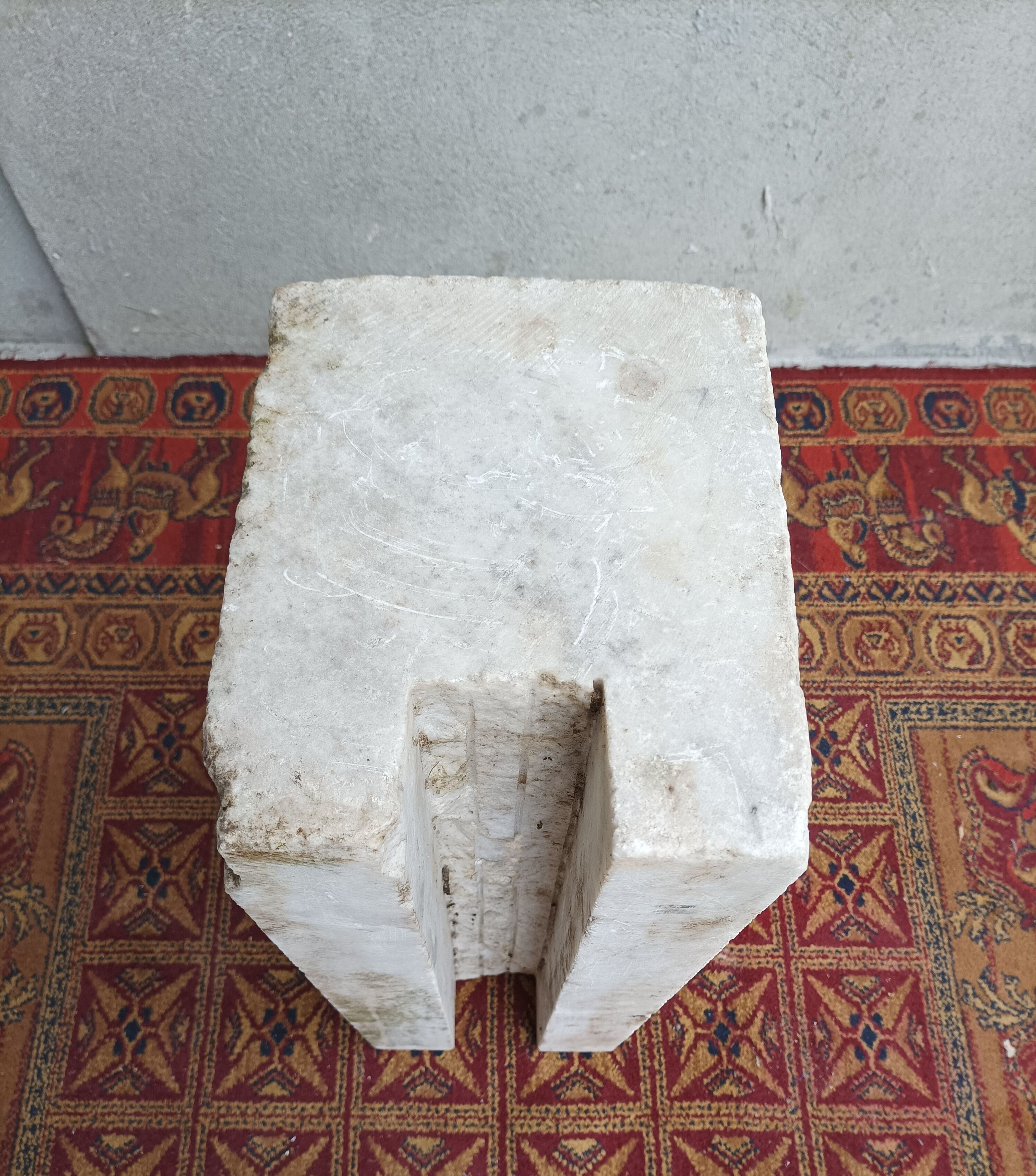 Sculpted Carrara marble stool column