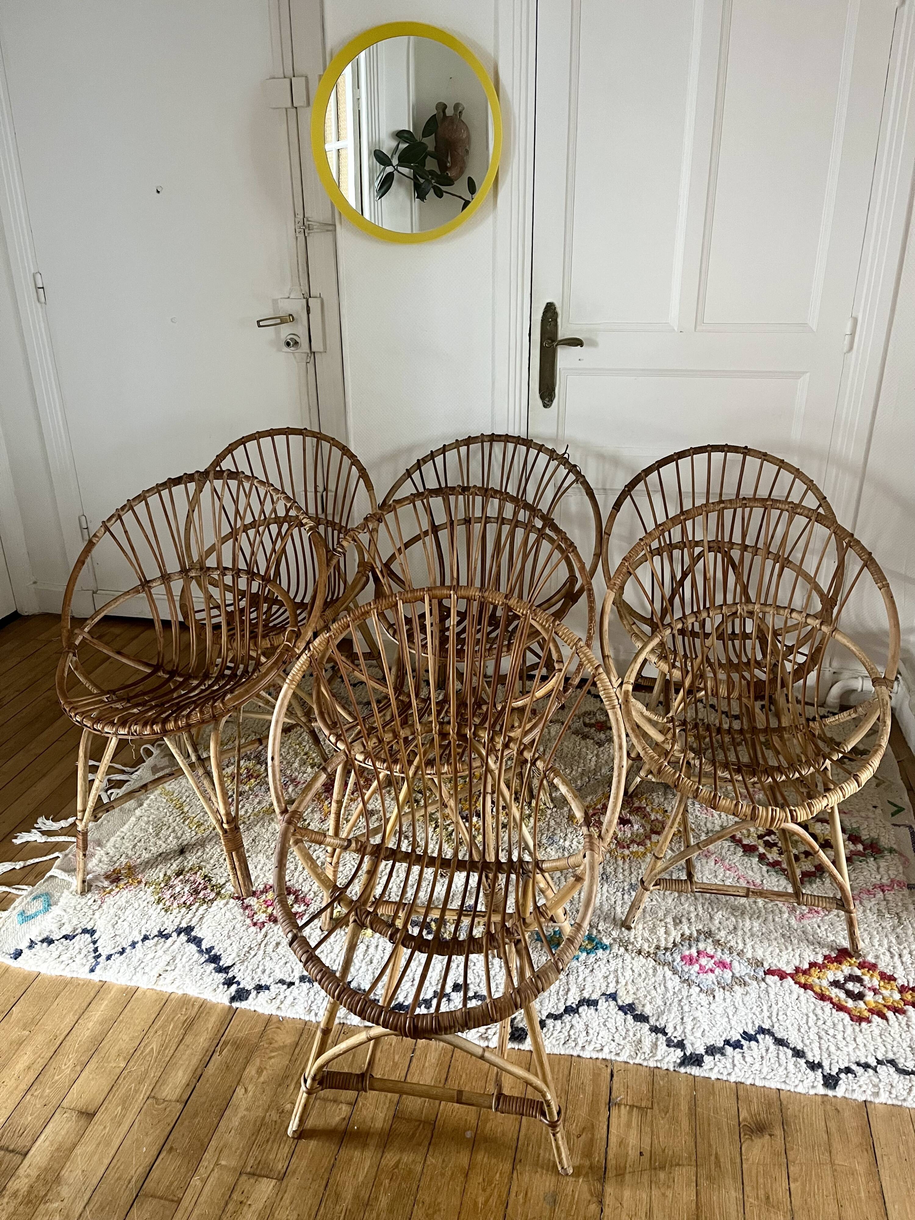 7 vintage rattan armchairs