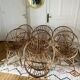 7 vintage rattan armchairs