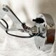 Vintage accordion wall light in chrome metal.