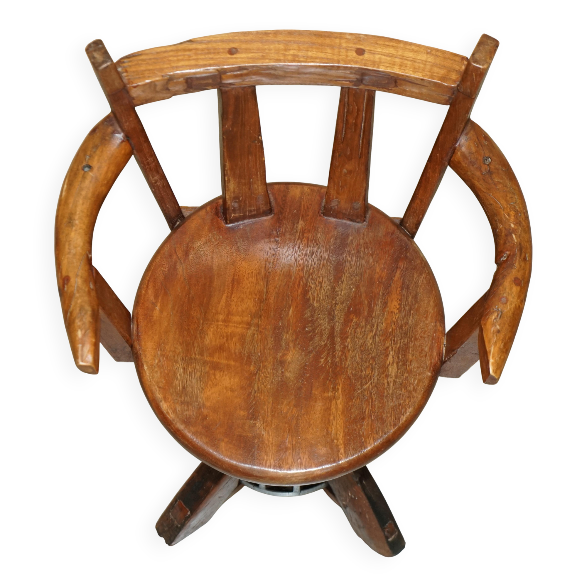 Antique captain's swivel chair on a draft horse wheel from around 1760.