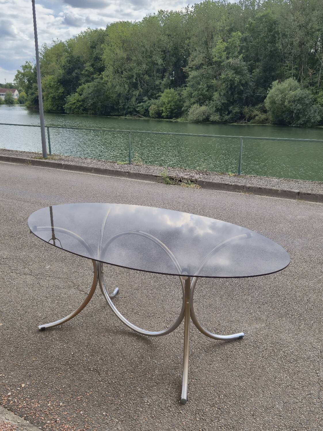 Vintage oval design table in smoked glass and chrome legs