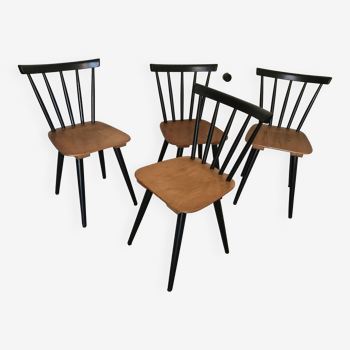 Set de 4 chaises vintage 1960’s à barreaux et pieds compas noirs