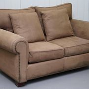Ralph Lauren Jamaica velvet sofa pair with feather cushions.