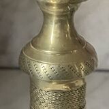 Pair of chiselled brass candlesticks from the 19th century.