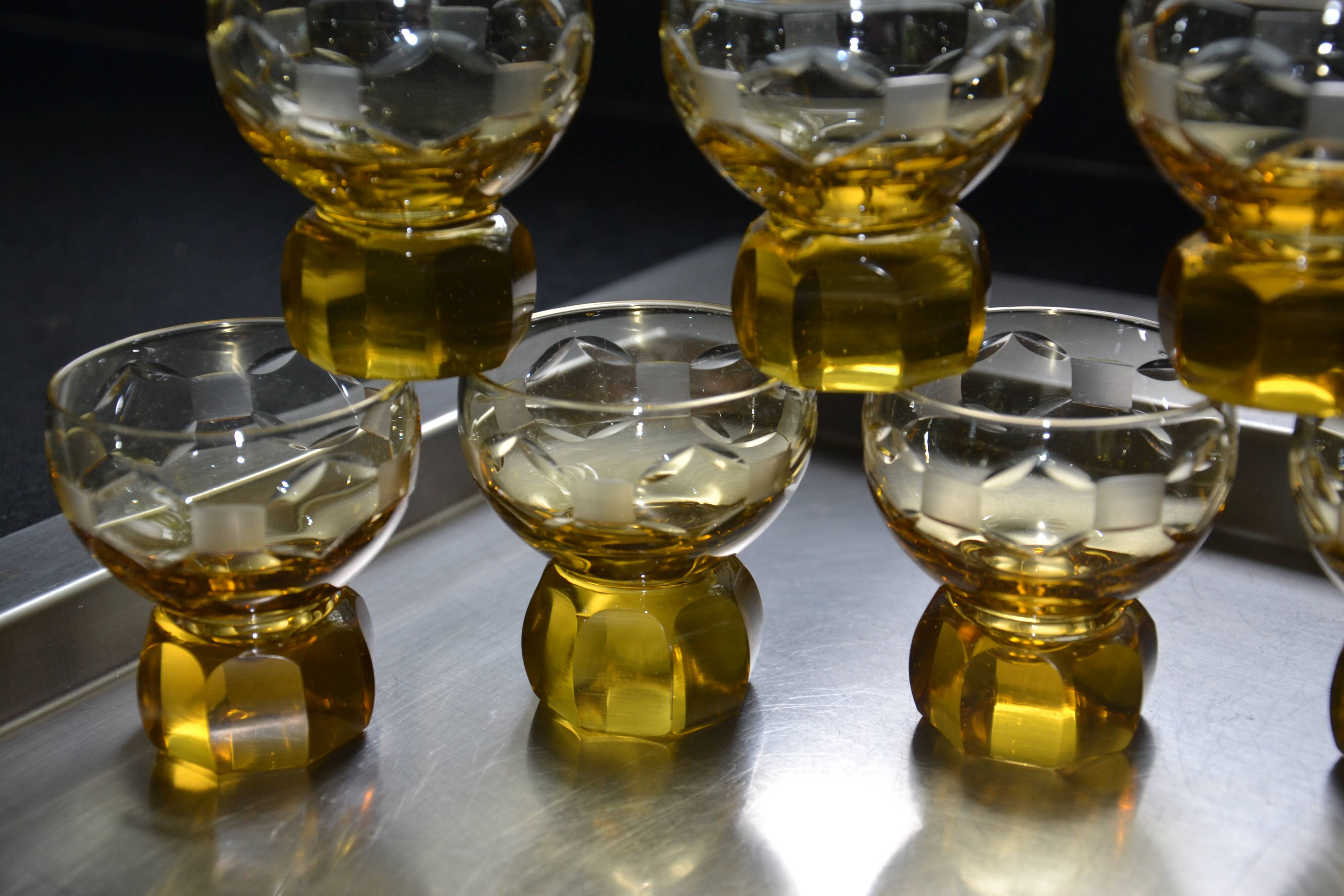 9 small amber art deco glasses