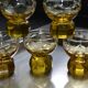 9 small amber art deco glasses