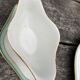 Sausage and porcelain ramekin