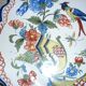 Decorative ceramic bird and cornucopia plate