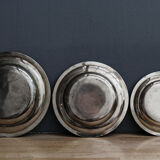 Series of 3 plates in silver metal, Ravinet punch
