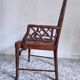 Fauteuil asiatique canné en bois à l'imitation du bambou
