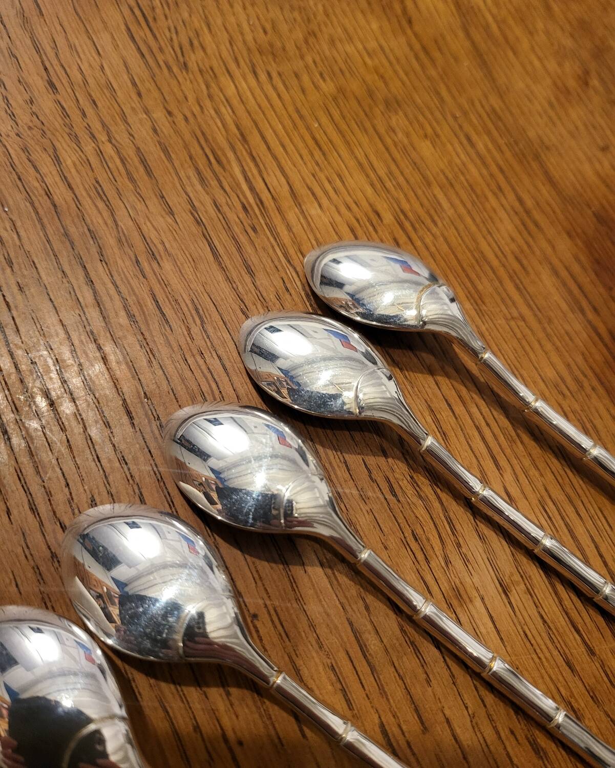 6 long silver-plated metal spoons